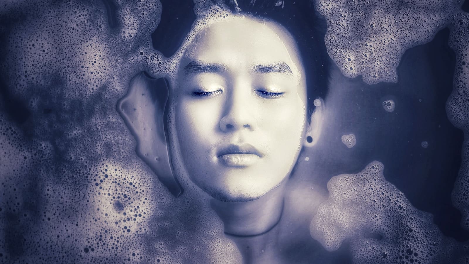 Face submerged in bath
